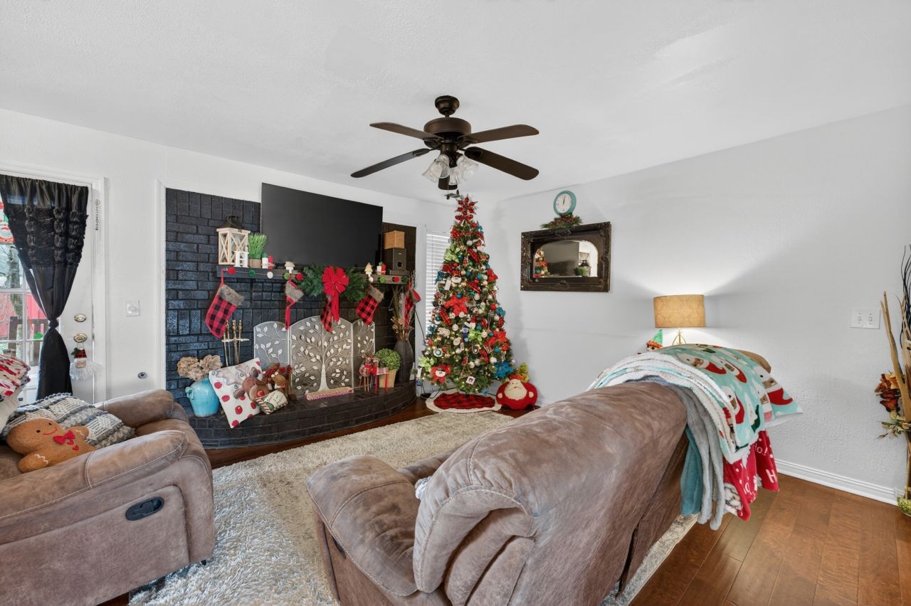 6045 Firelight Trail Antioch, TN 37013 - Photo 14 of 47 a bedroom with bed and a chandelier