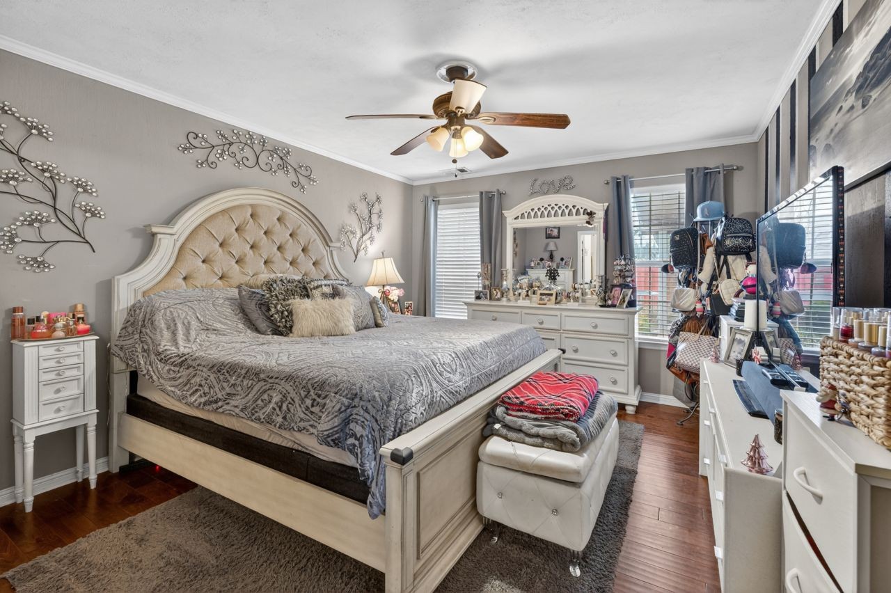 6045 Firelight Trail Antioch, TN 37013 - Photo 23 of 47 a living room with furniture and flat screen tv