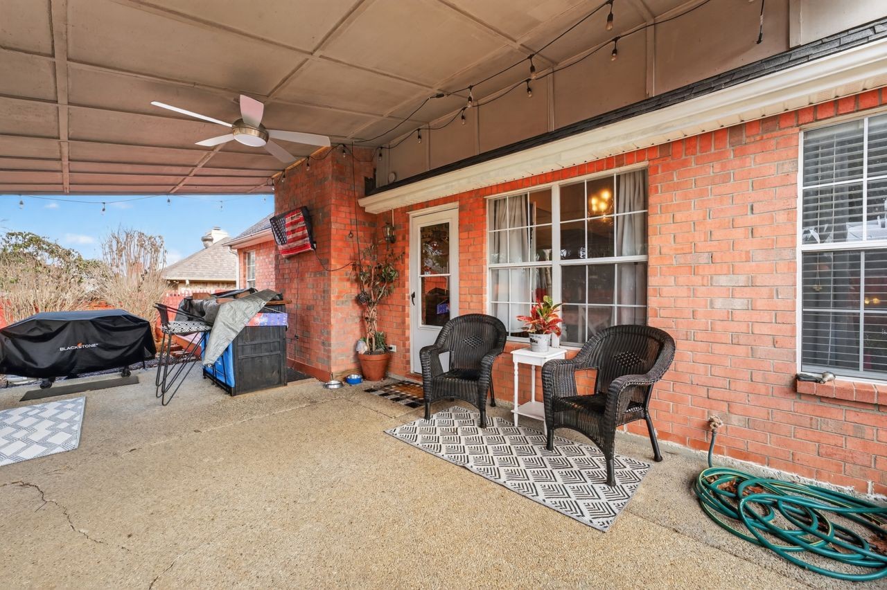 6045 Firelight Trail Antioch, TN 37013 - Photo 36 of 47 a view of a chairs and table in a patio