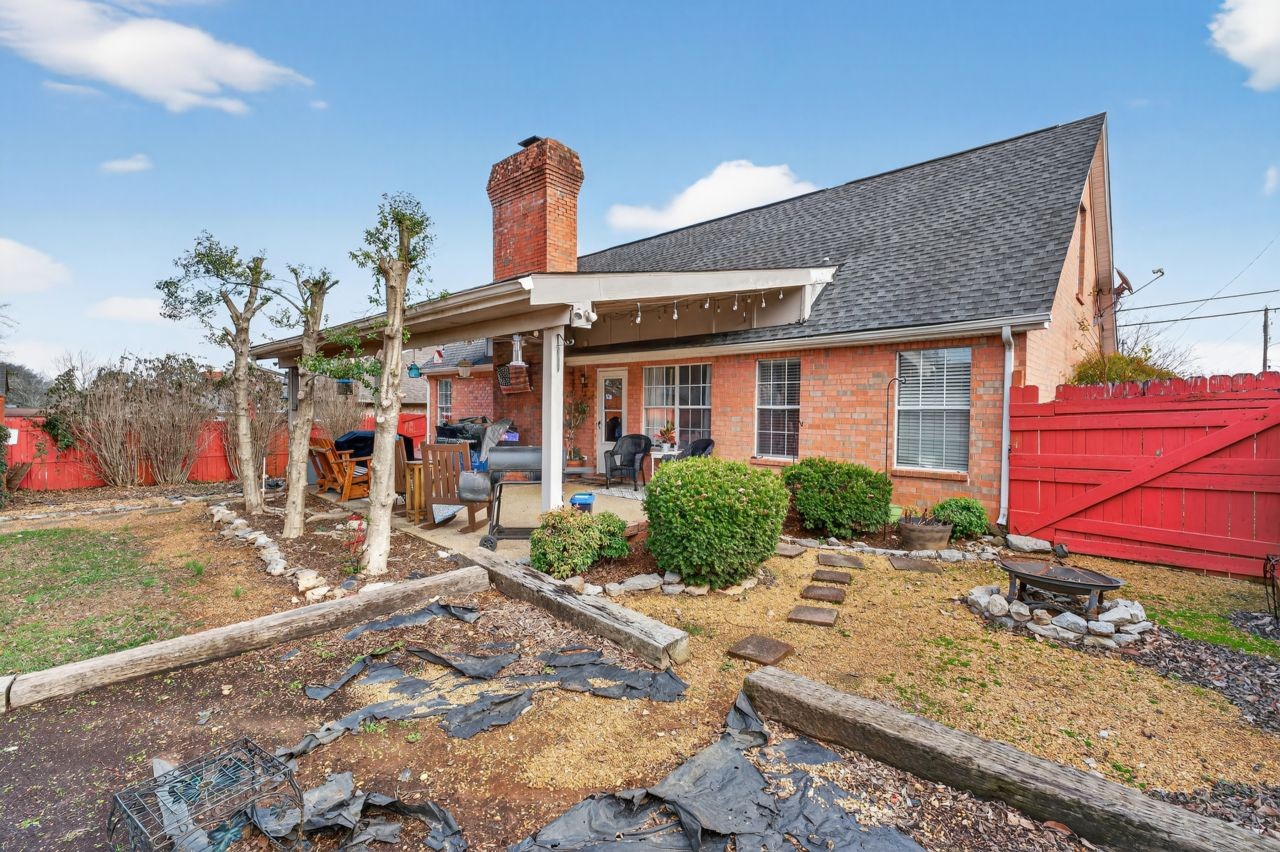 6045 Firelight Trail Antioch, TN 37013 - Photo 40 of 47 a front view of a house with garden