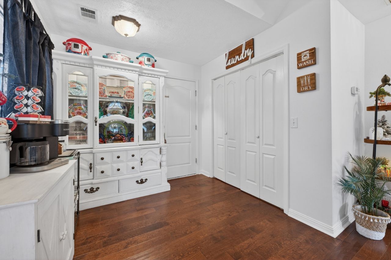 6045 Firelight Trail Antioch, TN 37013 - Photo 4 of 47 a view of room with window and wooden floor