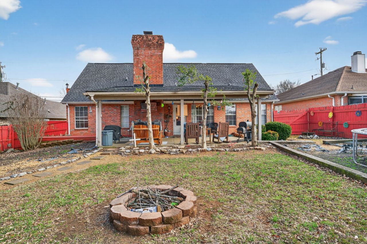 6045 Firelight Trail Antioch, TN 37013 - Photo 42 of 47 a view of a house with swimming pool and a yard