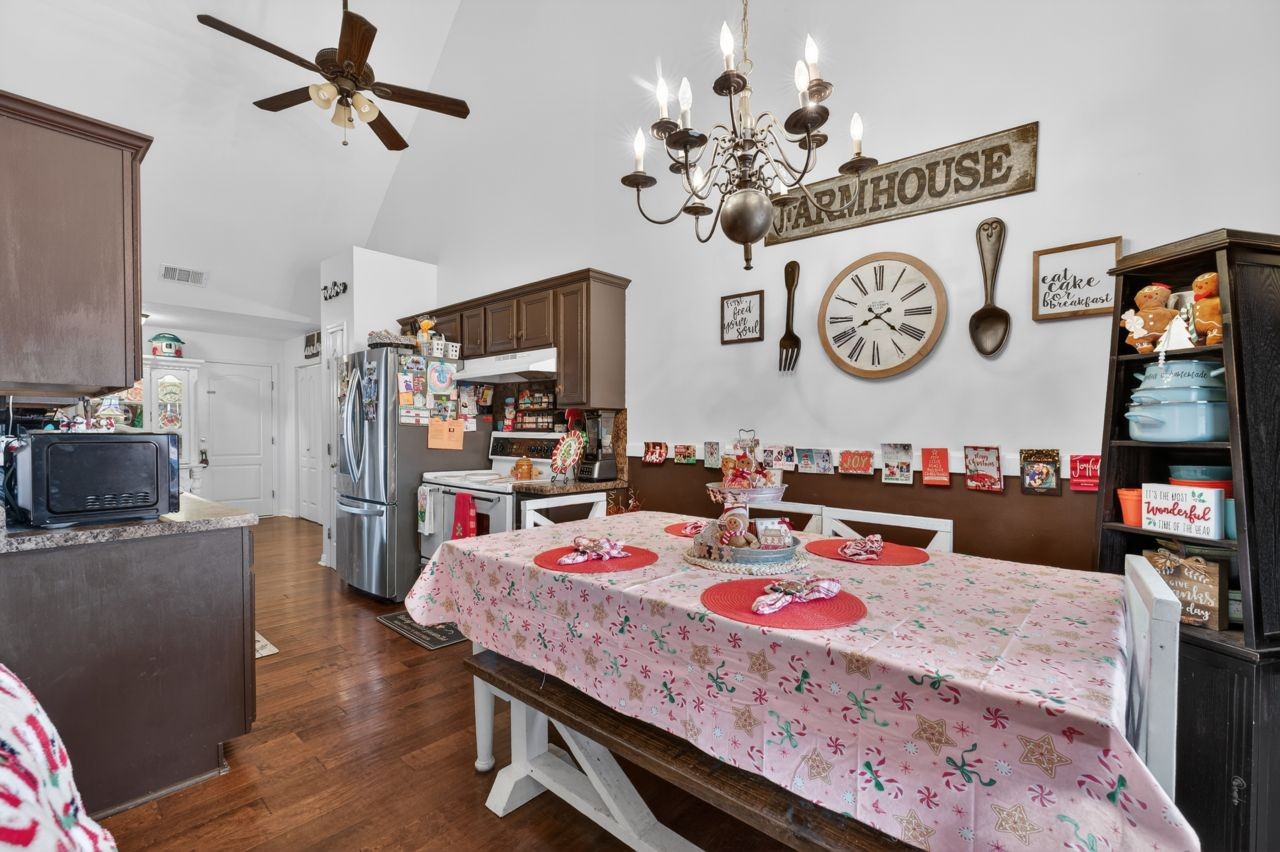 6045 Firelight Trail Antioch, TN 37013 - Photo 10 of 47 a view of a dining room with furniture