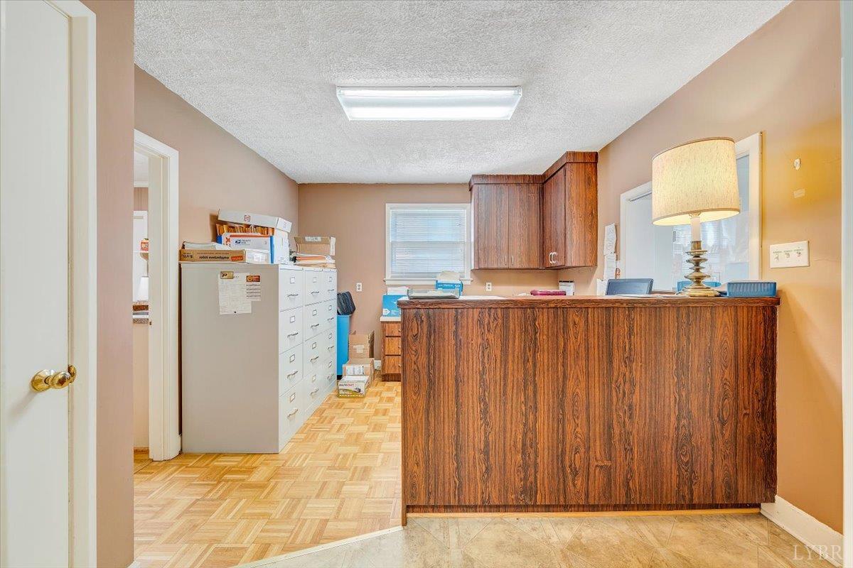 155 Laxton Road Lynchburg, VA 24502 - Photo 13 of 58 a view of a kitchen with wooden floor and a cabinet