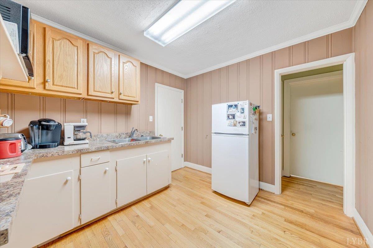 155 Laxton Road Lynchburg, VA 24502 - Photo 17 of 58 a kitchen with stainless steel appliances granite countertop a refrigerator and a stove