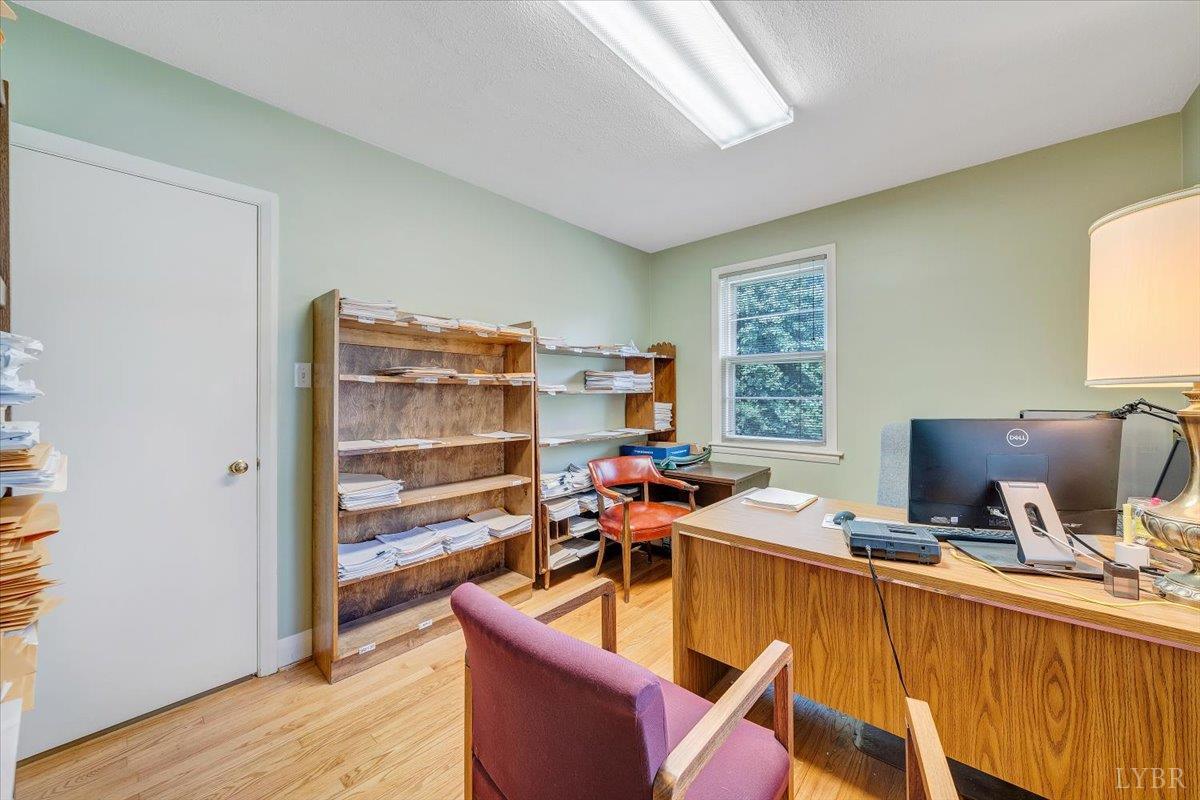 155 Laxton Road Lynchburg, VA 24502 - Photo 21 of 58 a view of a workspace with furniture and a window