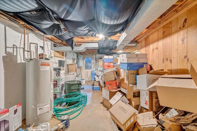 a living room with furniture and fireplace