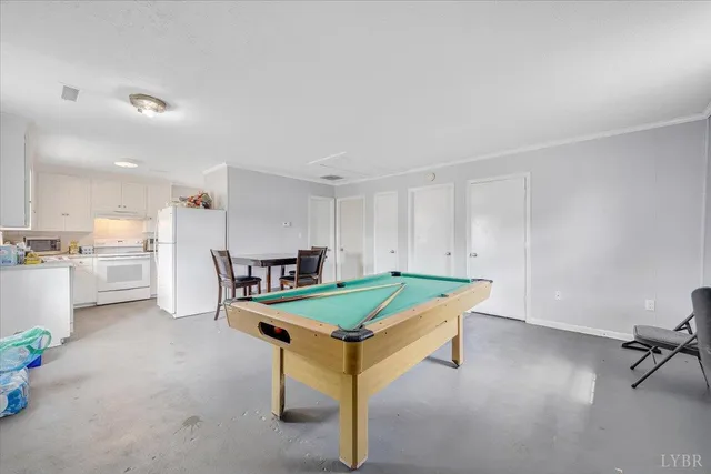 a room with furniture and a wooden floor