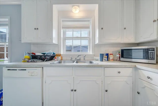 a view of a workspace with furniture