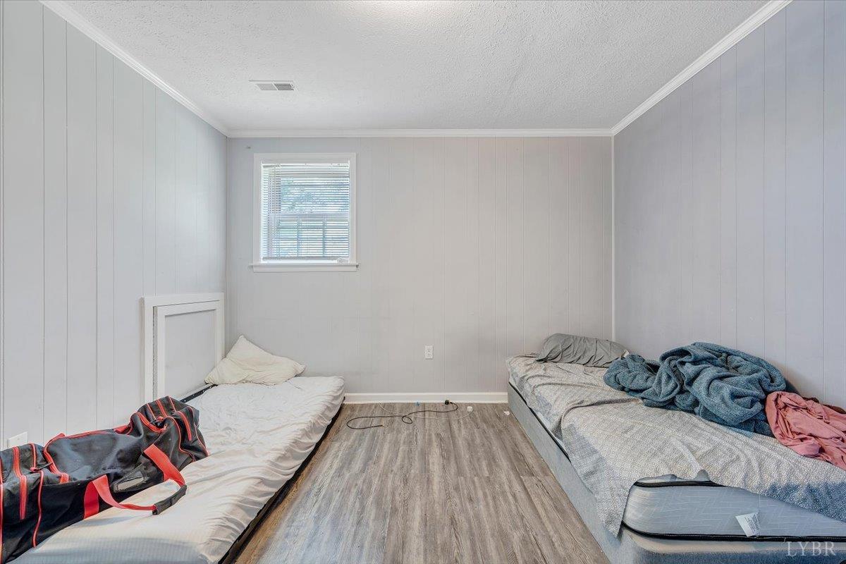 155 Laxton Road Lynchburg, VA 24502 - Photo 42 of 58 a bedroom with a bed and a couch