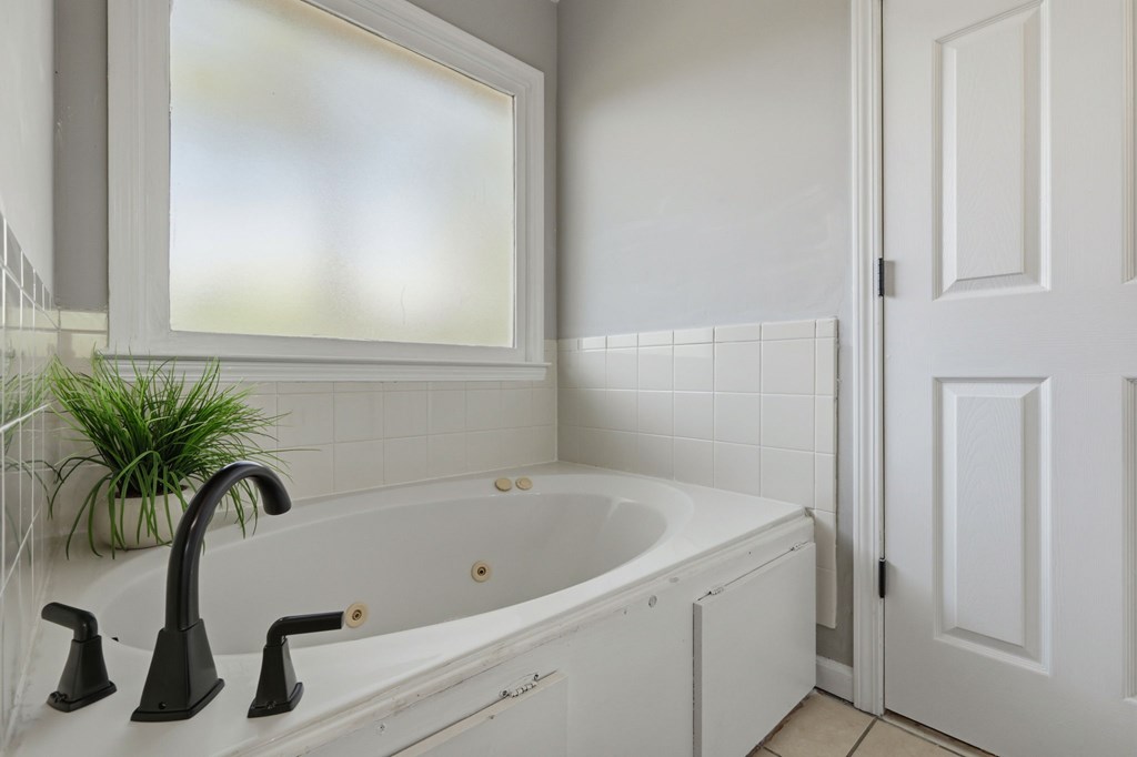 2222 Barnes Drive Columbus, GA 31907 - Photo 14 of 49 a bathroom with a bathtub