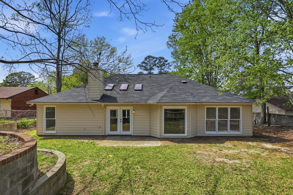 2222 Barnes Drive Columbus, GA 31907 - Photo 44 of 49 a front view of a house with a garden