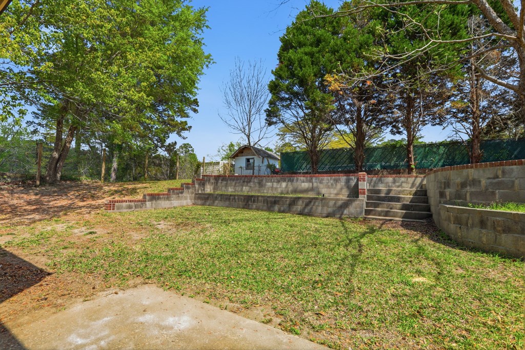 2222 Barnes Drive Columbus, GA 31907 - Photo 45 of 49 a view of backyard with tree
