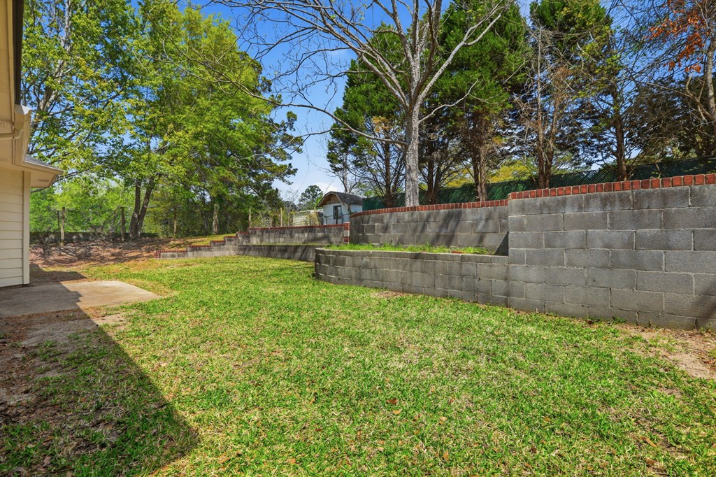 2222 Barnes Drive Columbus, GA 31907 - Photo 48 of 49 a view of backyard with tree