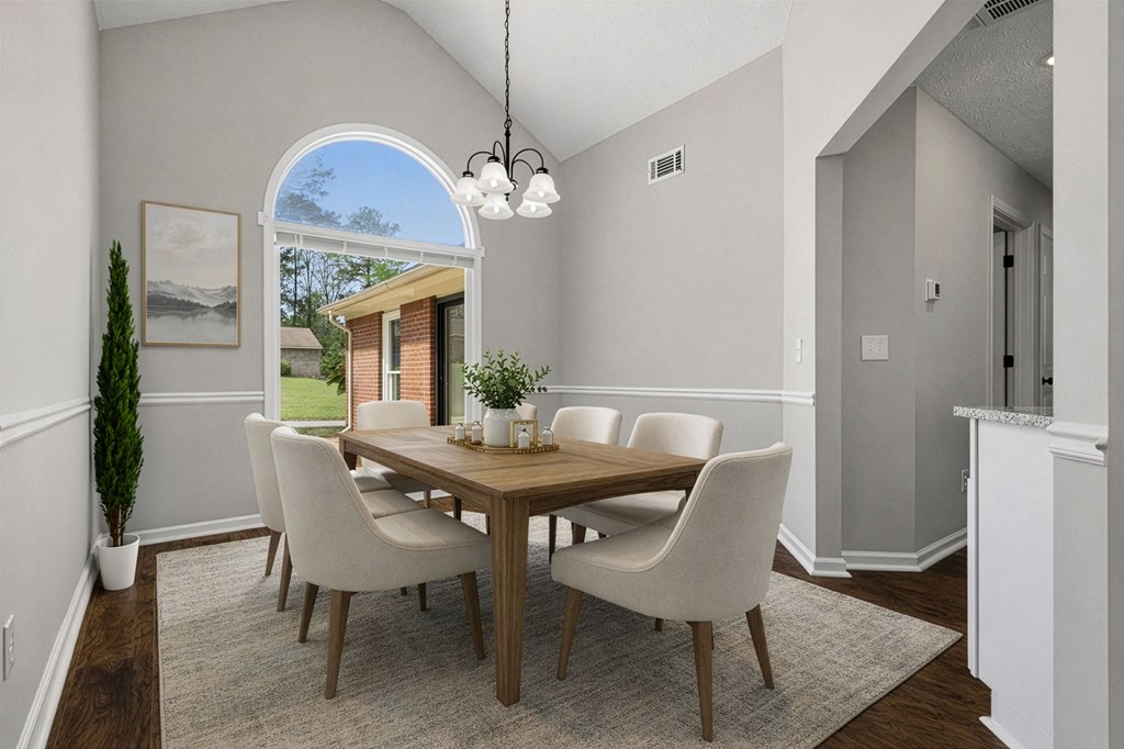 2222 Barnes Drive Columbus, GA 31907 - Photo 8 of 49 a view of a dining room with furniture and a chandelier