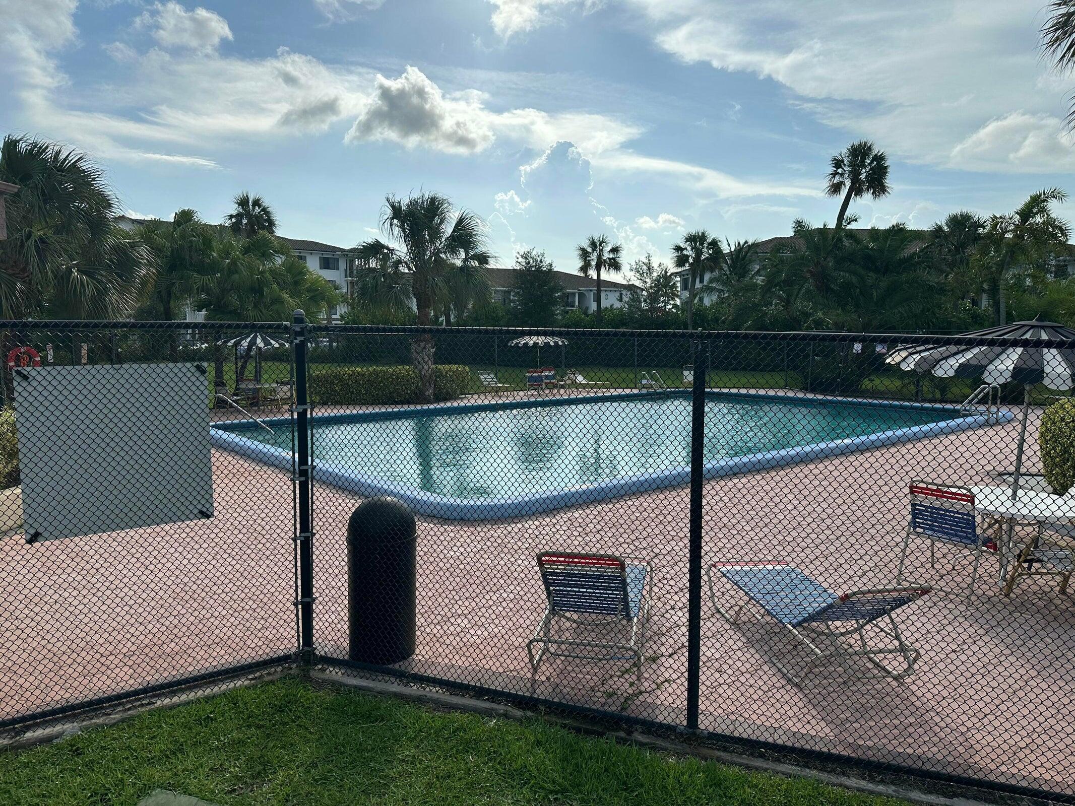 9355 Southwest 8th Street, Unit 421 Boca Raton, FL 33428 - Photo 19 of 20 a view of a terrace
