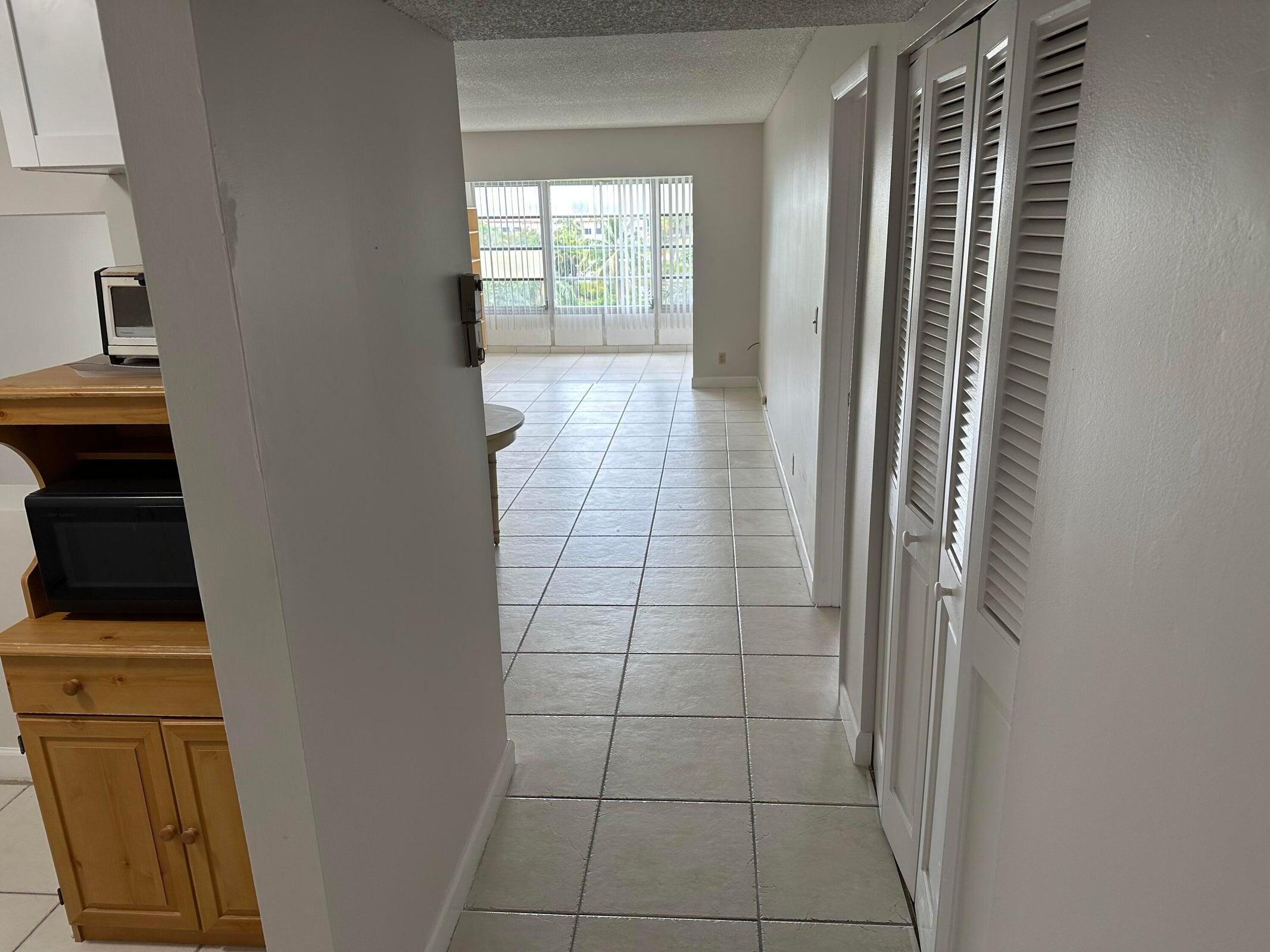 9355 Southwest 8th Street, Unit 421 Boca Raton, FL 33428 - Photo 8 of 20 a view of a storage & utility room