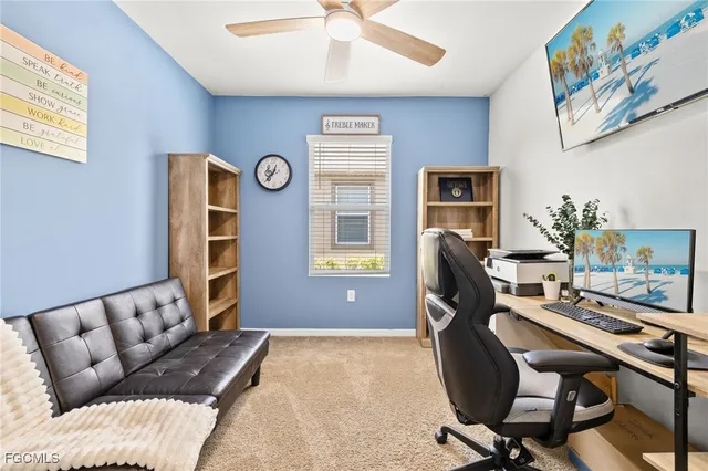 a workspace with furniture and a window