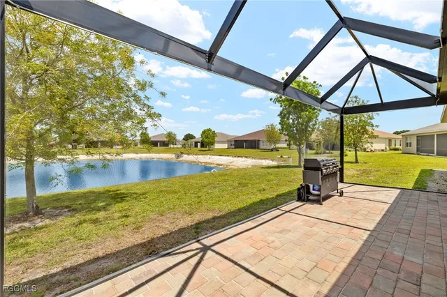 a view of swimming pool with a patio
