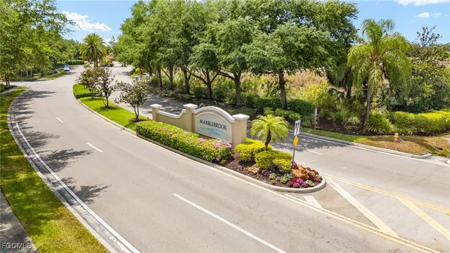 a view of a swimming pool and a yard