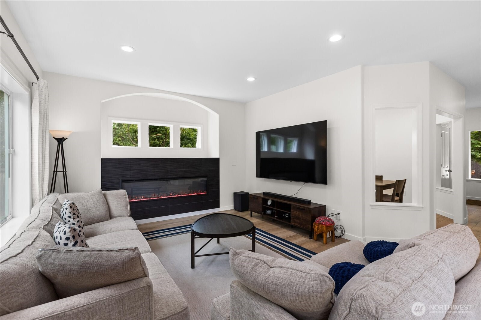 15325 Sunset Road Bothell, WA 98012 - Photo 11 of 40 a living room with furniture and a fireplace