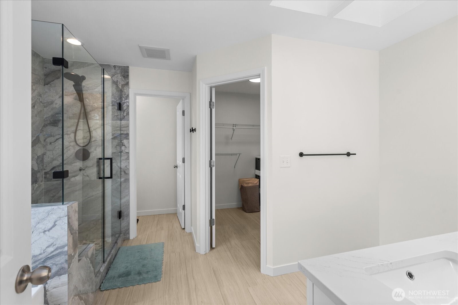 15325 Sunset Road Bothell, WA 98012 - Photo 18 of 40 a bathroom with a shower and a sink