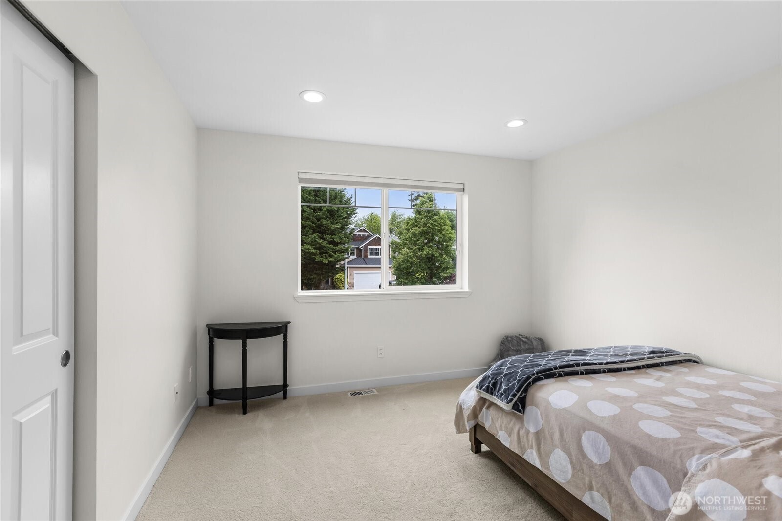 15325 Sunset Road Bothell, WA 98012 - Photo 23 of 40 a bedroom with a bed and a window