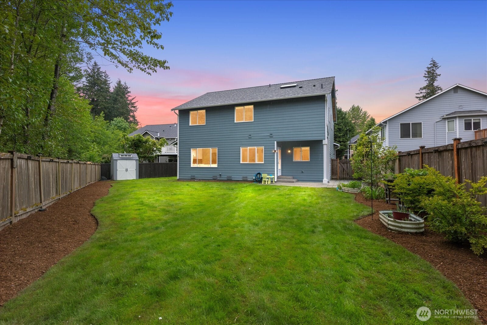 15325 Sunset Road Bothell, WA 98012 - Photo 30 of 40 a front view of a house with a yard