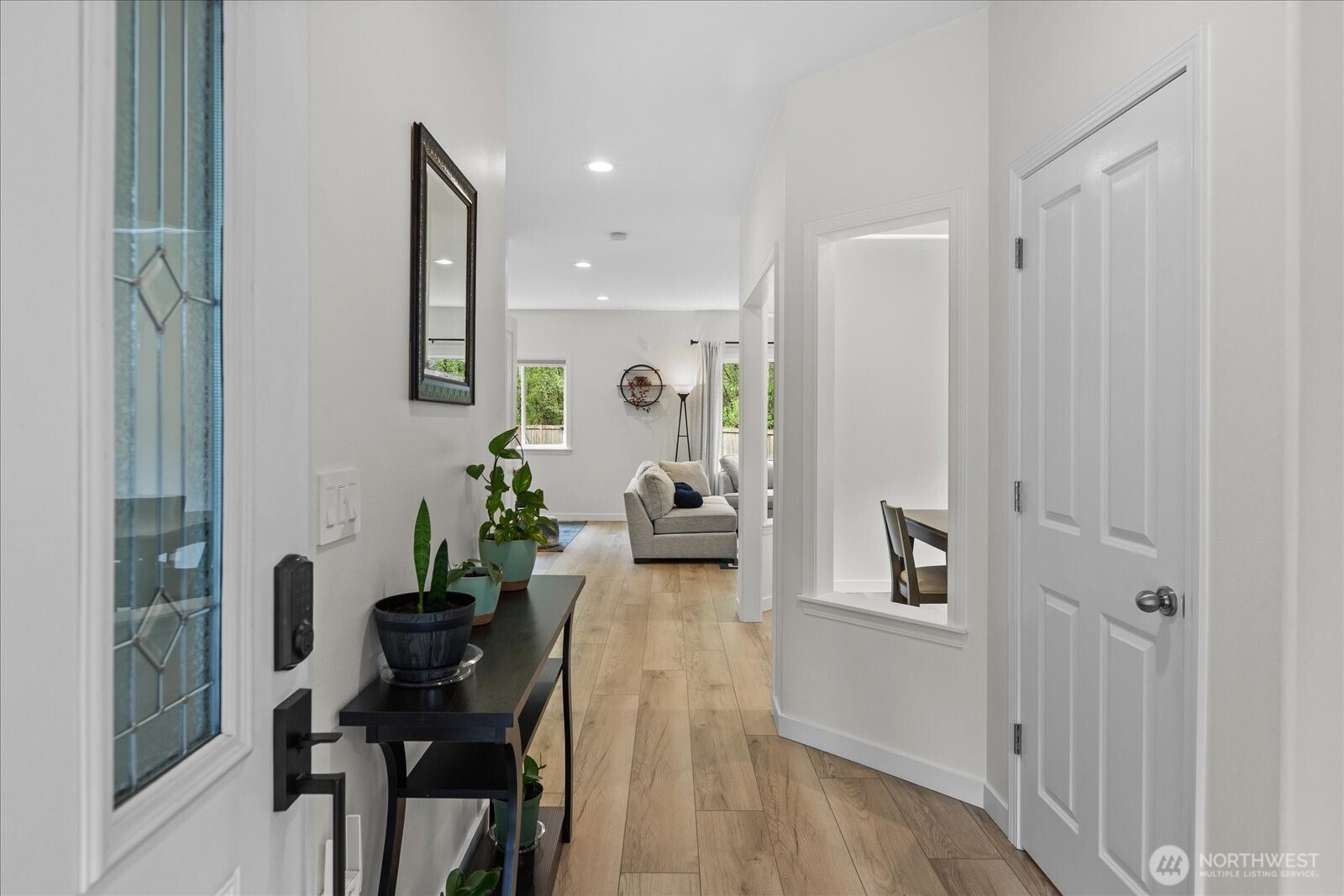 15325 Sunset Road Bothell, WA 98012 - Photo 3 of 40 a living room with furniture and a table