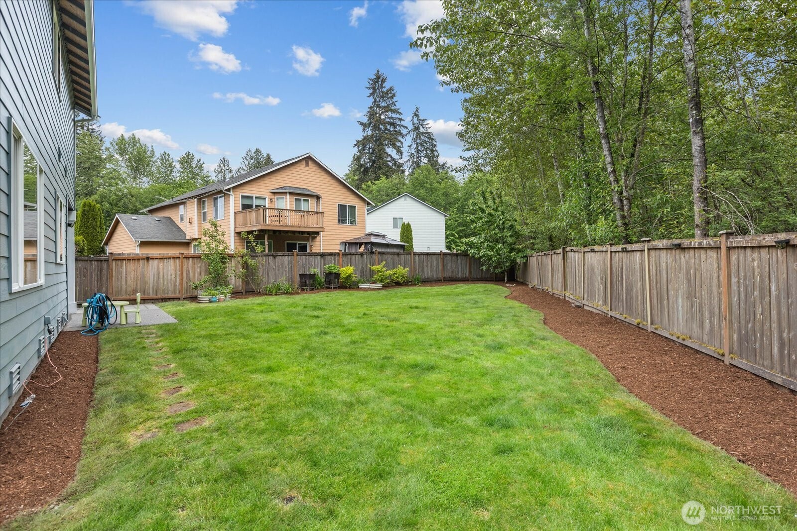 15325 Sunset Road Bothell, WA 98012 - Photo 34 of 40 a front view of a house with yard and green space