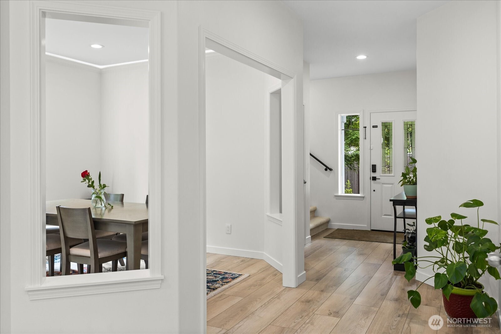 15325 Sunset Road Bothell, WA 98012 - Photo 4 of 40 a view of an entryway with wooden floor