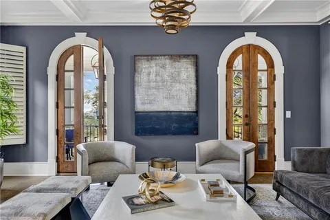 a dining room with furniture window and outside view