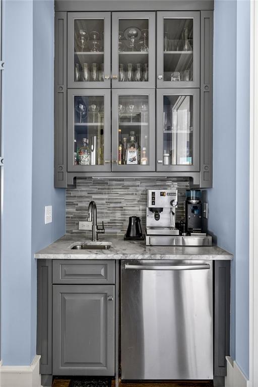 1326 Lanier Boulevard Northeast Atlanta, GA 30306 - Photo 27 of 84 a kitchen with stainless steel appliances granite countertop a sink stove and cabinets