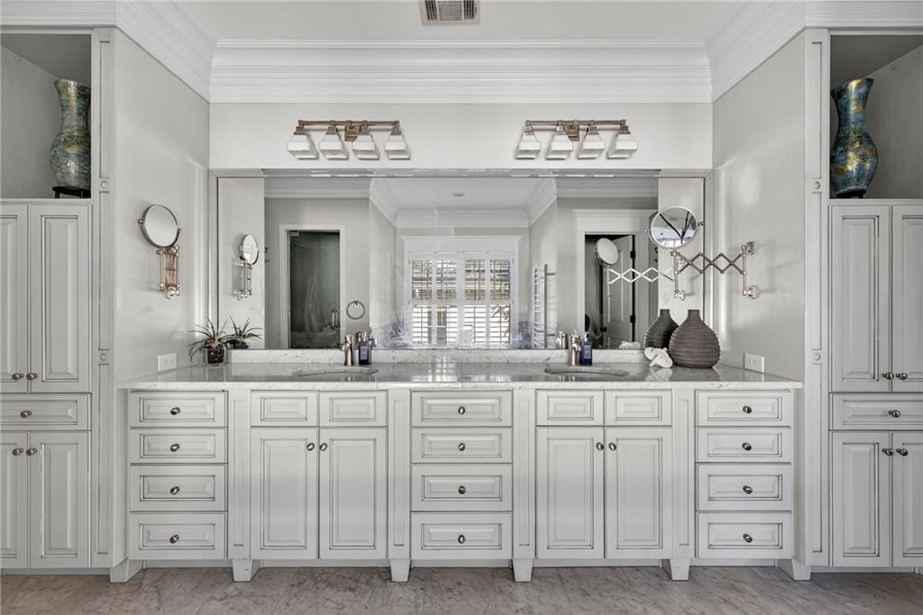 1326 Lanier Boulevard Northeast Atlanta, GA 30306 - Photo 47 of 84 a spacious bathroom with double sink and a mirror