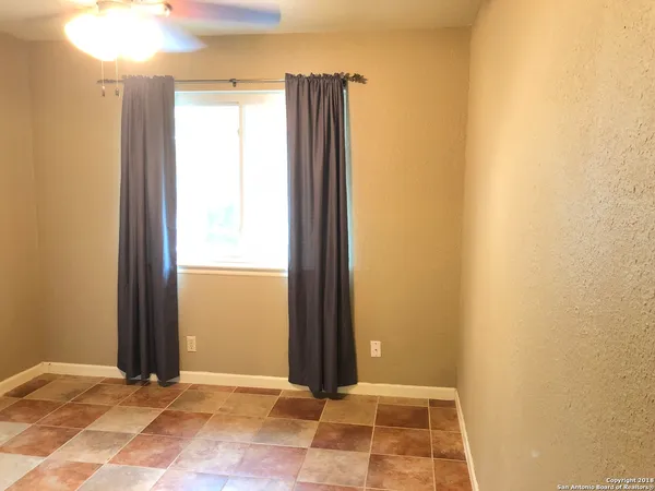 a view of entryway with a front door