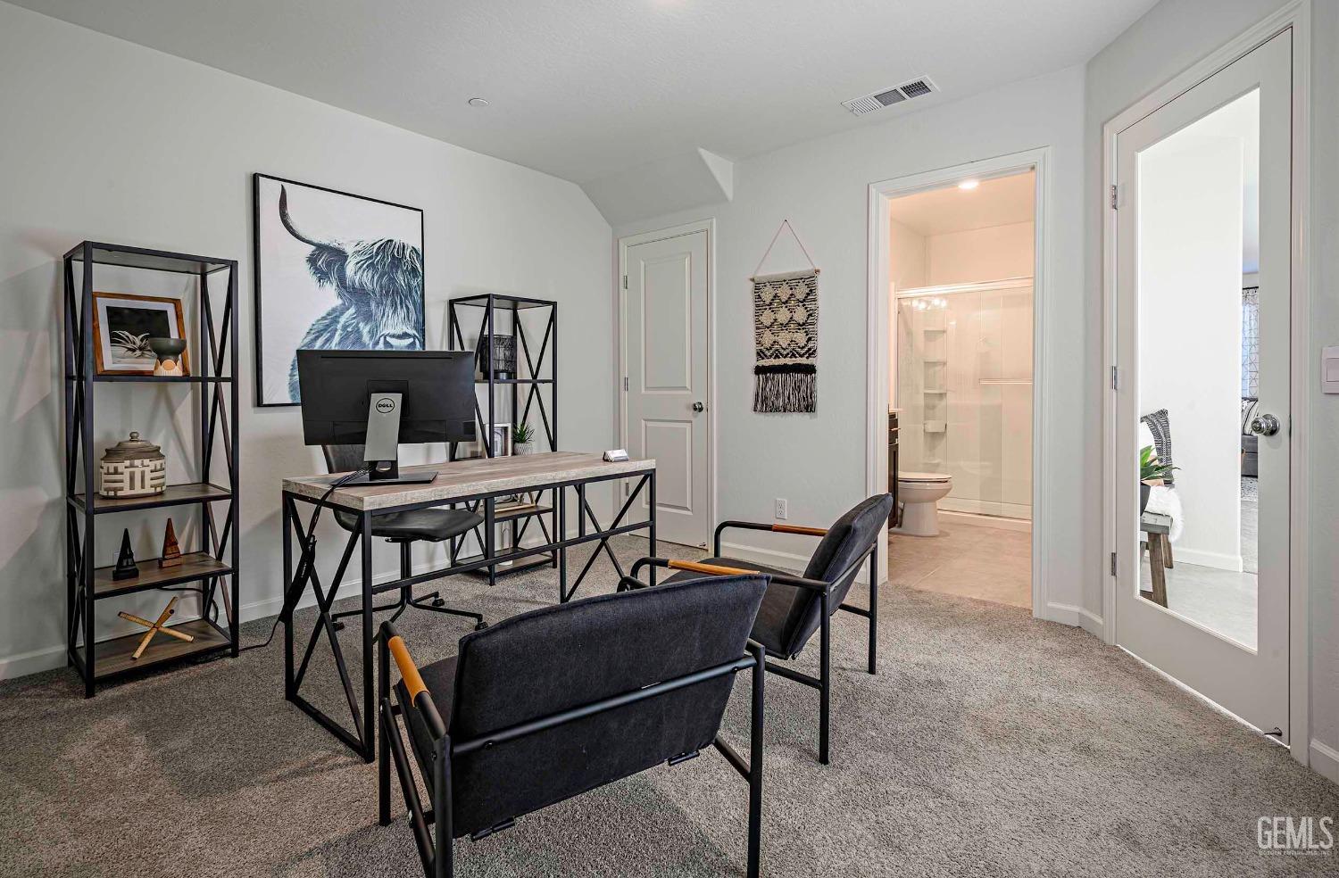 Undisclosed Address Bakersfield, CA 93313 - Photo 11 of 34 a view of a livingroom with furniture and a wooden floor