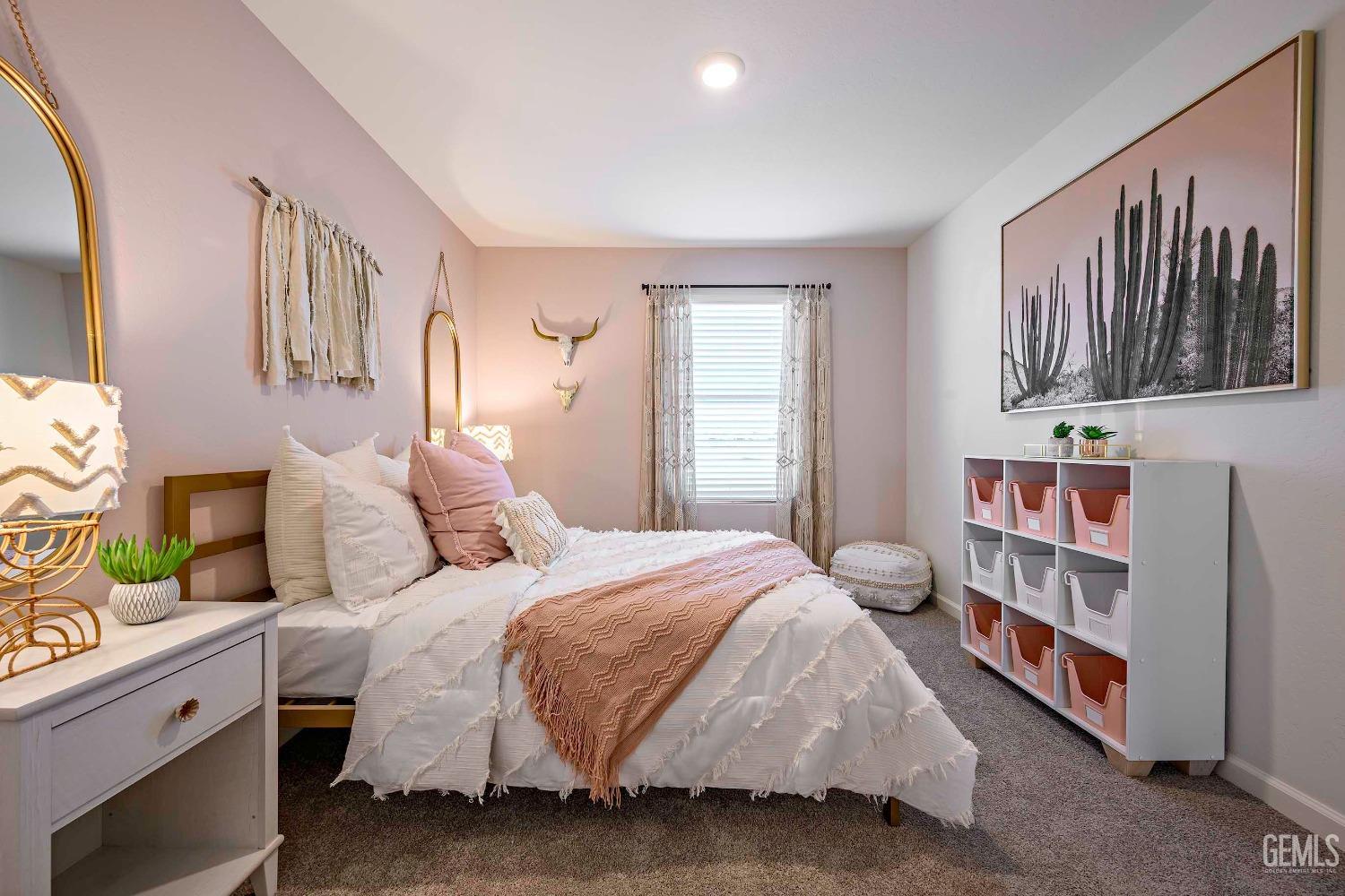 Undisclosed Address Bakersfield, CA 93313 - Photo 22 of 34 a bedroom with a bed and a book shelf