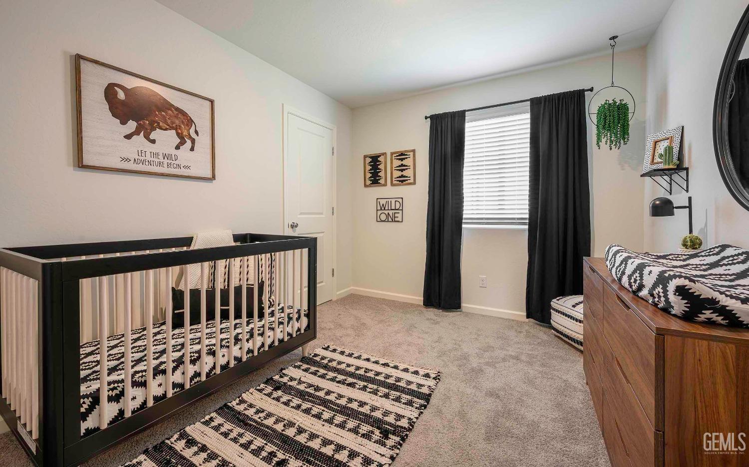 Undisclosed Address Bakersfield, CA 93313 - Photo 23 of 34 a bedroom with furniture and a window