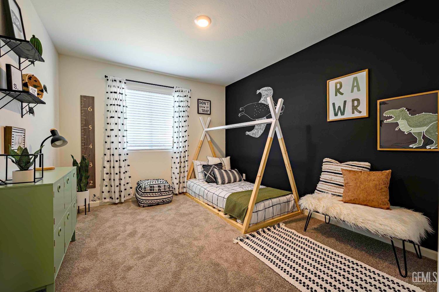 Undisclosed Address Bakersfield, CA 93313 - Photo 28 of 34 a bedroom with furniture and a gym machine