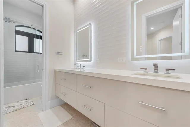 a bathroom with a sink and a bathtub