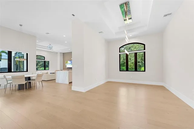 a view of a livingroom with furniture and windows
