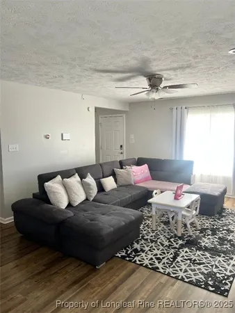 a living room with furniture and a couch
