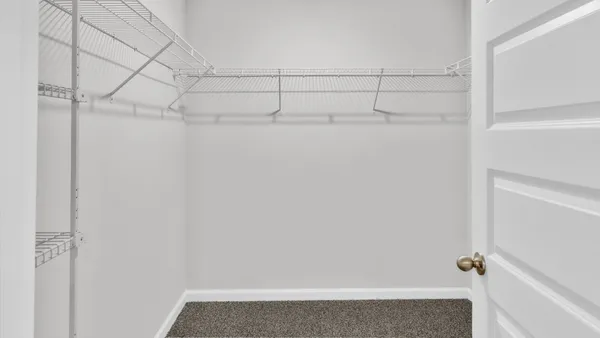 a view of small space with racks on the wall