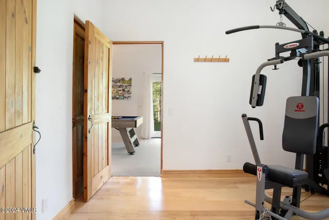 a view of a room with gym equipment