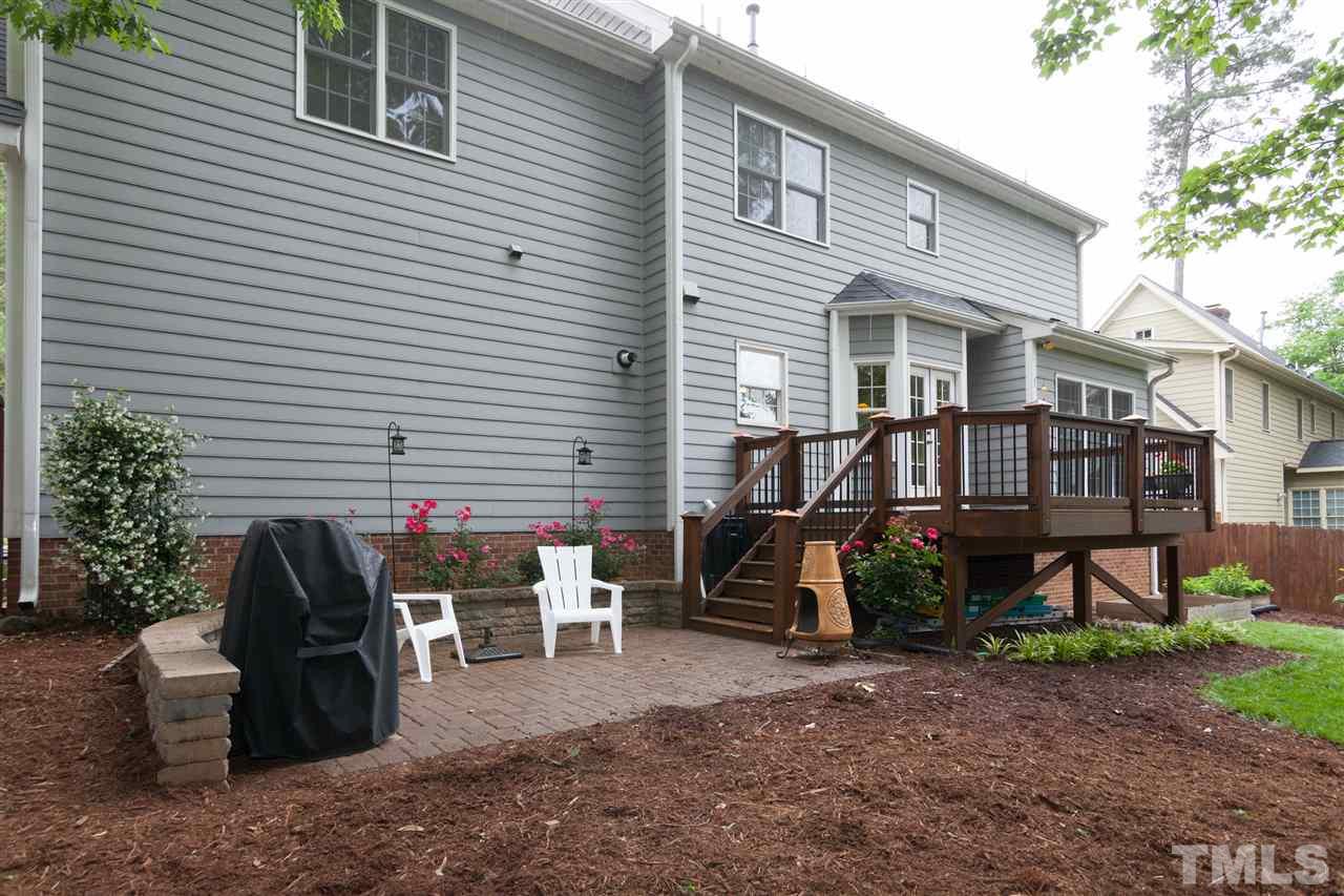 124 Huntsmoor Lane Cary, NC 27513 - Photo 25 of 25 a view of a house with backyard and sitting area