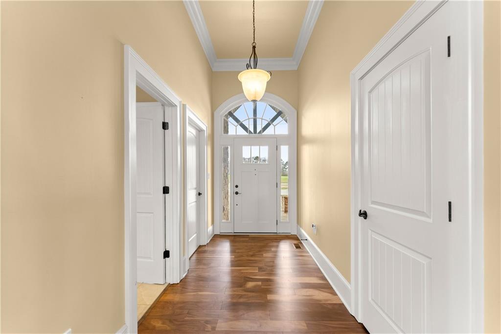 725 County Farm Road Jefferson, GA 30549 - Photo 10 of 66 a view of a hallway with wooden floor and cabinet
