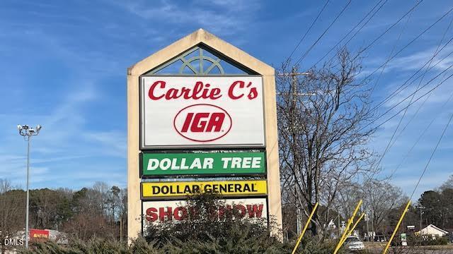 1572 Rhodes Pond Street Wendell, NC 27591 - Photo 37 of 42 a sign on the side of a building