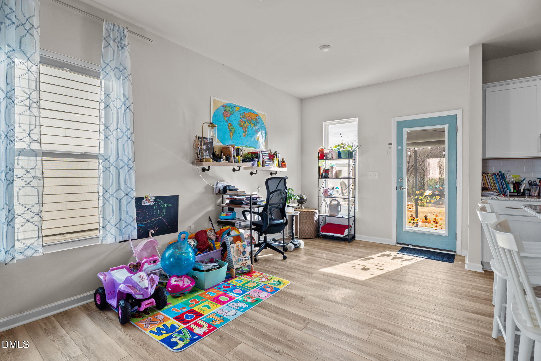 1572 Rhodes Pond Street Wendell, NC 27591 - Photo 9 of 42 a living room with furniture and a wooden floor