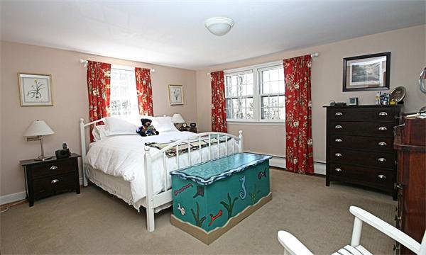 317 Concord Road Wayland, MA 01778 - Photo 16 of 20 a bedroom with a bed and a window