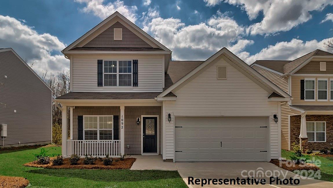186 Wheatfield Road Fletcher, NC 28732 - Photo 1 of 25 a front view of a house with a yard